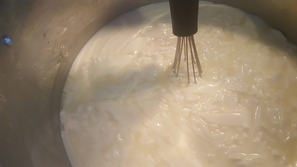 Cut the curd with a whisk